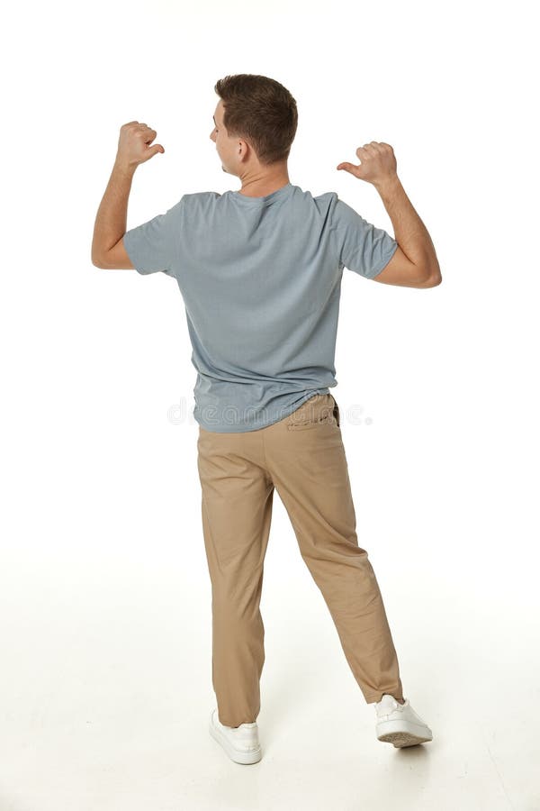 happy guy looking up and pointing up stock image