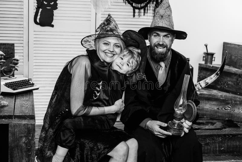 Happy halloween. Family love and tenderness. October traditions. Little boy hugs mom. Mother, Dad and Son. Happy father royalty free stock image Happy halloween. Family love and tenderness. October traditions. Little boy hugs mom. Mother, Dad and Son. Happy father royalty free stock image
