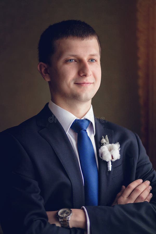 A Man in a Suit Posing in the Hallway of Hotel in Full Length Stock ...