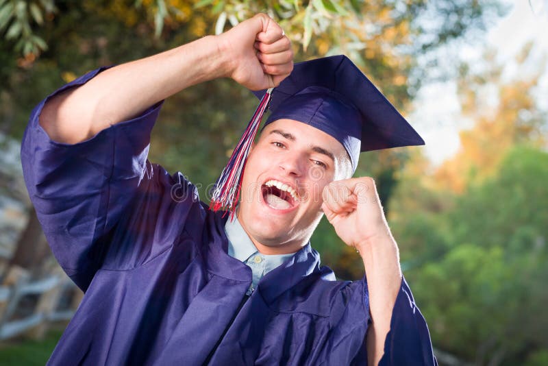 Happy Handsome Male Graduate in Cap and Gown Outside Stock Image ...