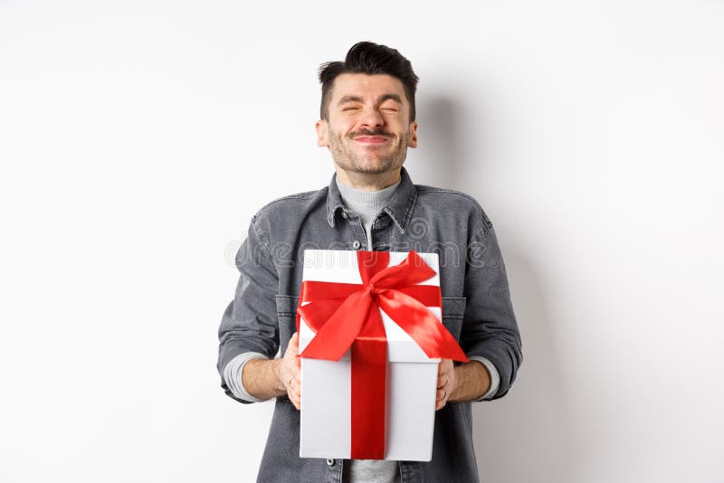 Happy Handsome Young Man Holding Big Valentines Day Gift and Cheering ...