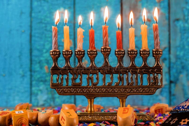 Happy Hanukkah of jewish holiday Hanukkah with menorah. By wooden dreidels, religion, celebration, judaism, traditional, symbol, candle, festival, religious royalty free stock photo Happy Hanukkah of jewish holiday Hanukkah with menorah. By wooden dreidels, religion, celebration, judaism, traditional, symbol, candle, festival, religious royalty free stock photo