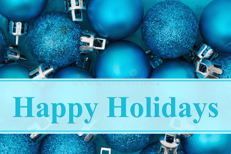 Happy Holidays greeting. Some bright blue sparkle and matte Christmas ball ornaments with text Happy Holidays stock photo Happy Holidays greeting. Some bright blue sparkle and matte Christmas ball ornaments with text Happy Holidays stock photo