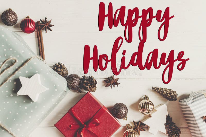 Happy holidays text, seasonal greetings card sign. christmas fla royalty free stock photo Happy holidays text, seasonal greetings card sign. christmas fla royalty free stock photo