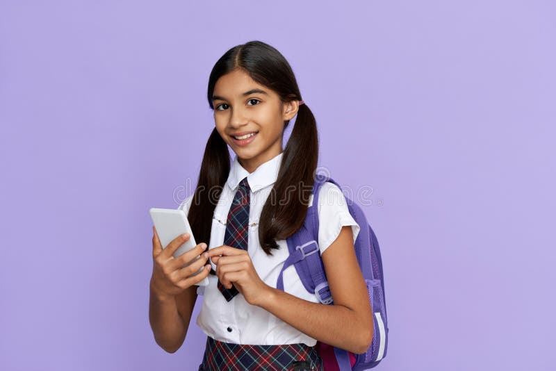 Happy Indian Kid School Girl Holding Smart Phone Isolated on Lilac  Background. Stock Image - Image of internet, digital: 196370281