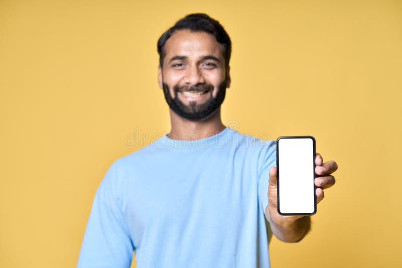 Happy Indian Young Man Holding Parcel Box Isolated on Blue Background ...