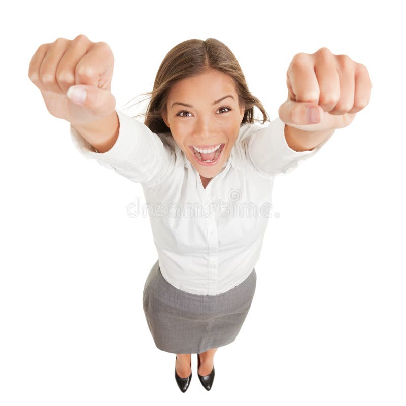 Happy jubilant you woman cheering. Fun high angle perspective of a vivacious jubilant you woman cheering and raising her clenched fists arms to the camera in royalty free stock photos Happy jubilant you woman cheering. Fun high angle perspective of a vivacious jubilant you woman cheering and raising her clenched fists arms to the camera in royalty free stock photos