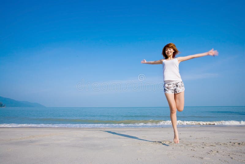 Happy jumping woman