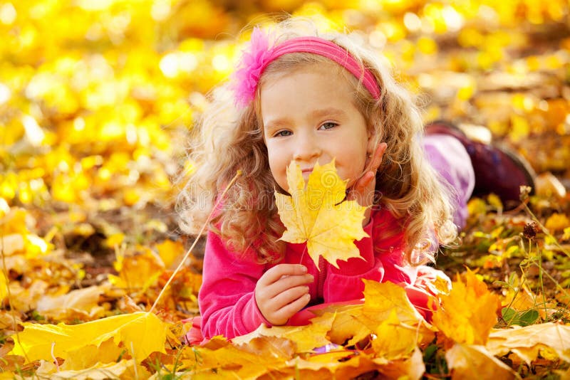Happy kid in autumn park stock photo. Image of girl, laughing - 25786978
