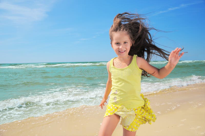 Happy kid on the beach stock image. Image of child, happy - 40784409