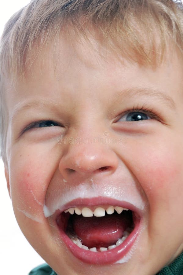 Happy kid with milky face stock image. Image of healthy 12291001