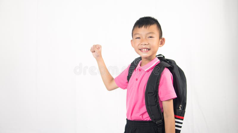 Happy kid student holding backpack on white background