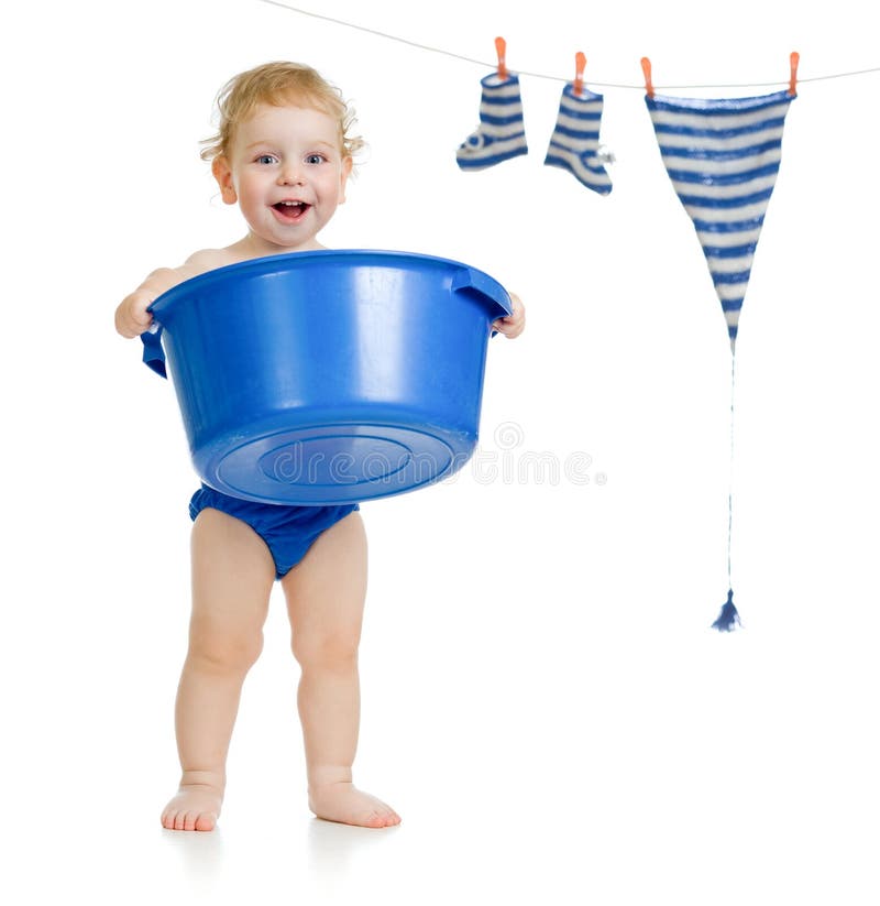 Happy kid washing his accessories stock image