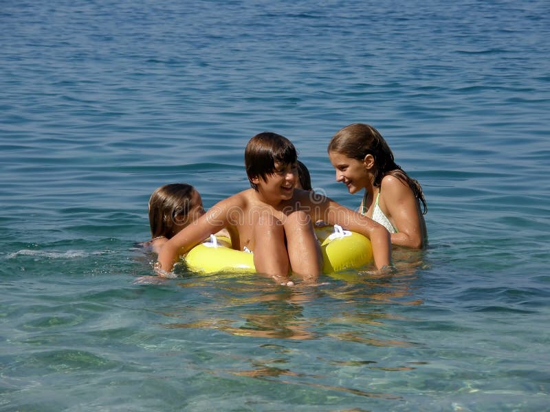 Happy children with beach toys enjoy in summer fun on Adriatic sea. Happy children with beach toys enjoy in summer fun on Adriatic sea