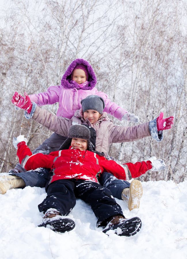 Happy kids on snow stock photo Happy kids on snow stock photo