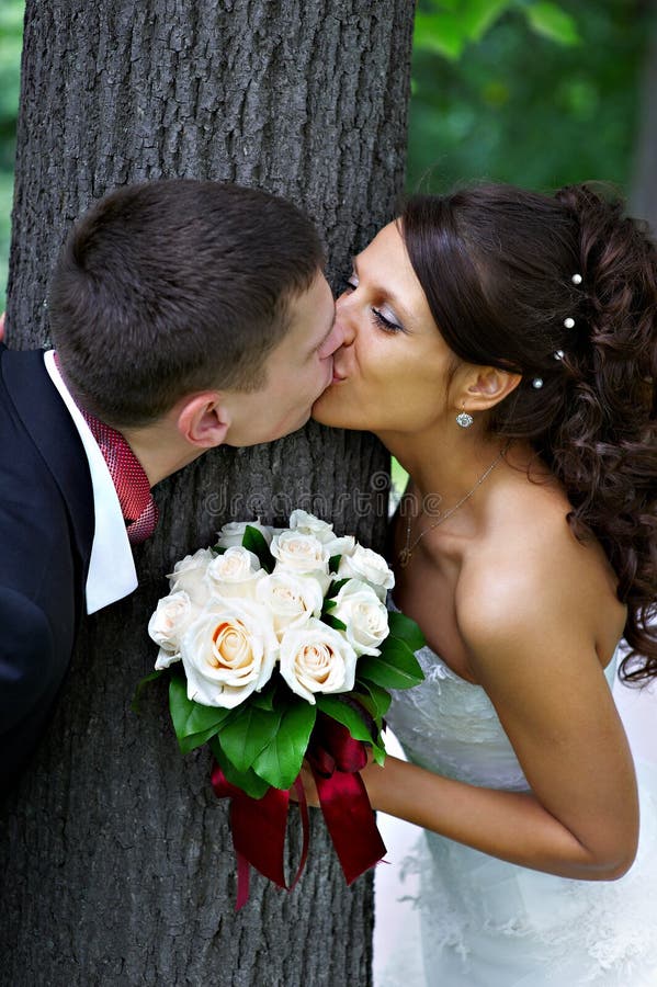 Happy kiss bride and groom