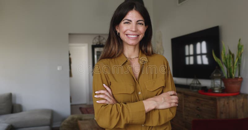 Happy Latina woman, new flat owner or tenant portrait stock footage