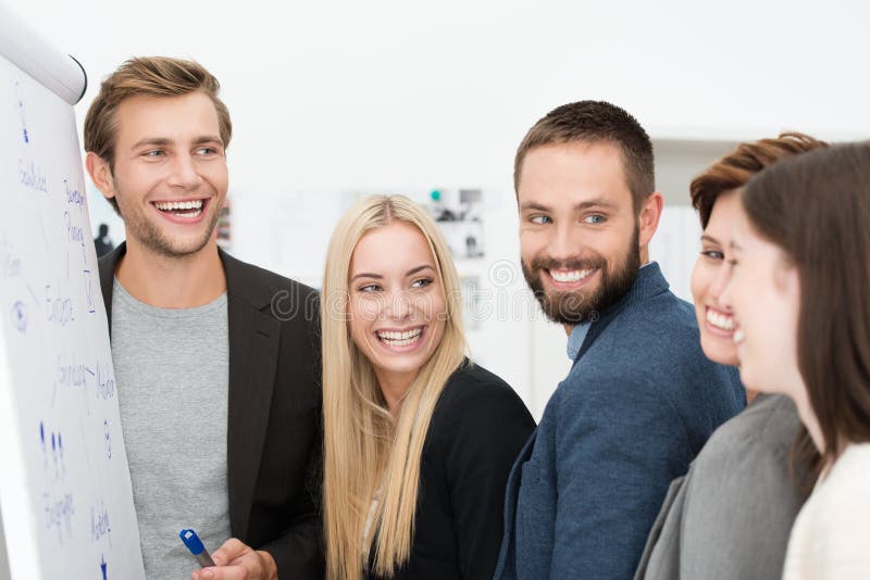 Happy laughing group of businesspeople