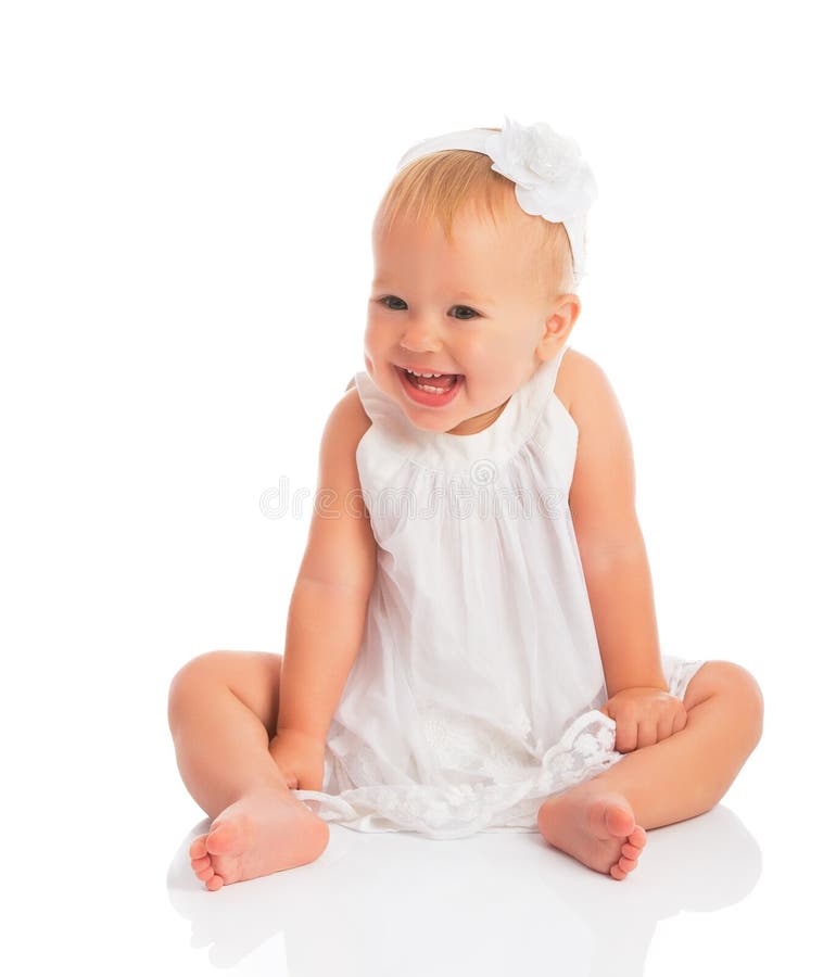 Happy Little Baby Girl In White Dress Laughs Isolated On White Stock