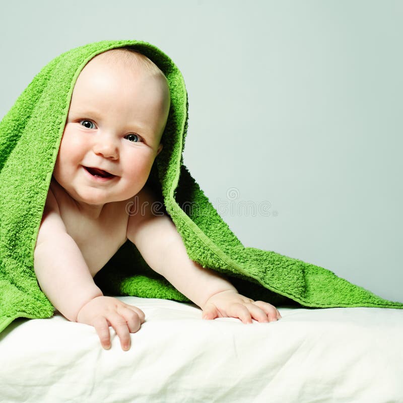 Happy Little Baby with Green Towel. Laughing Little Child Stock Photo ...