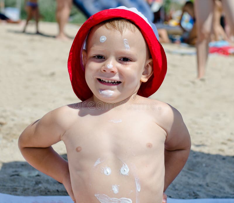 Happy little boy at the beach