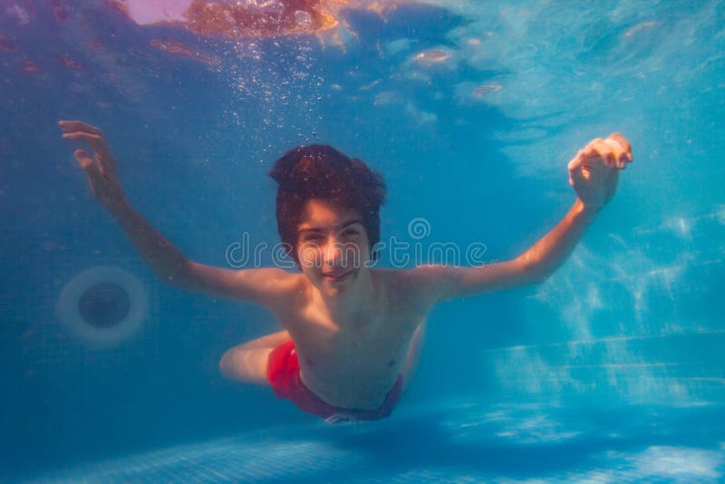 Handsome Boy Swim Underwater With Fishes Portrait Stock Photo Image