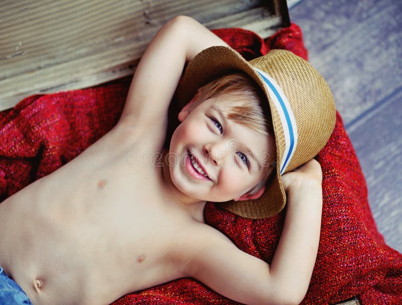 Happy little boy with hat