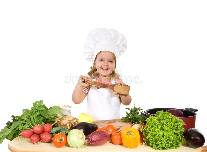 Happy little chef with lots of vegetables stock images Happy little chef with lots of vegetables stock images