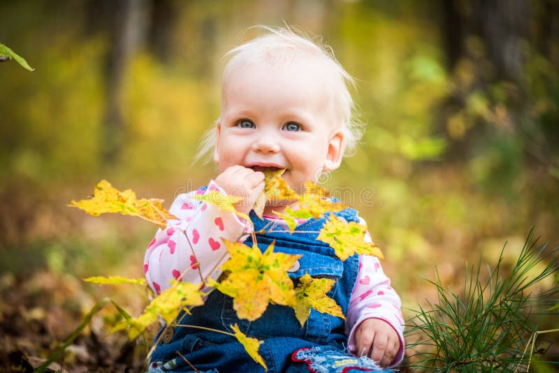 Happy Baby Girl Laughing and Playing in the Autumn on the Forest Stock ...