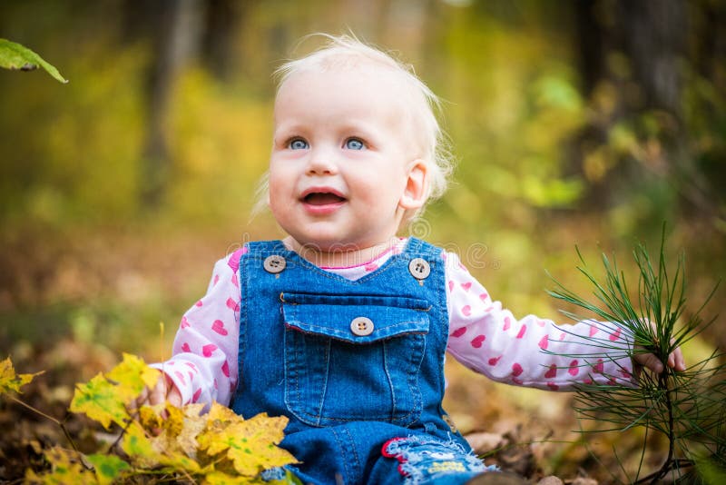 Happy Baby Girl Laughing and Playing in the Autumn on the Forest Stock ...