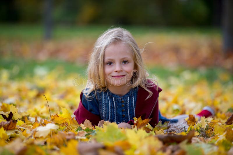 Happy Little Child, Girl Laughing and Playing in Autumn Park Stock ...