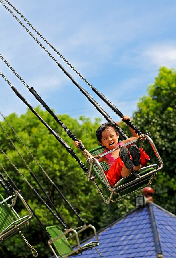 Amusement park of the little girl is so happy. Amusement park of the little girl is so happy.