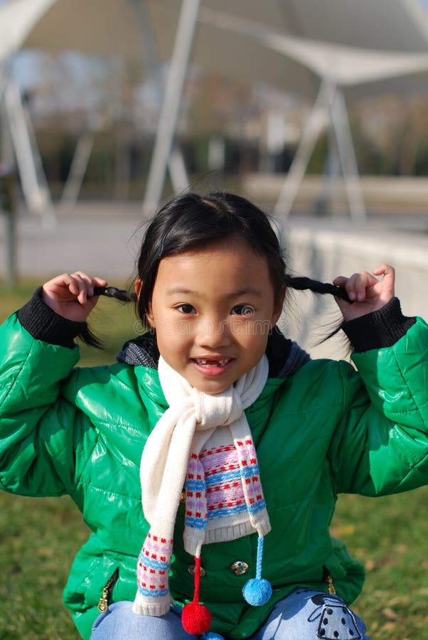 Chinese Girl Wearing A Pink Dress Stock Image - Image of nose ...