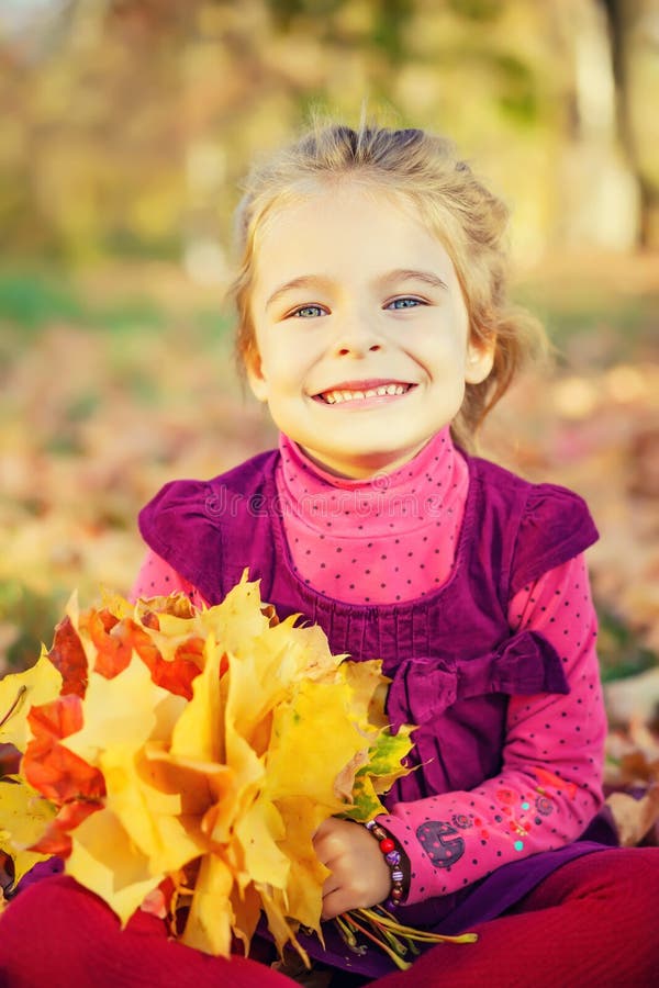 Happy Little Girl with Autumn Leaves Stock Photo - Image of fall ...