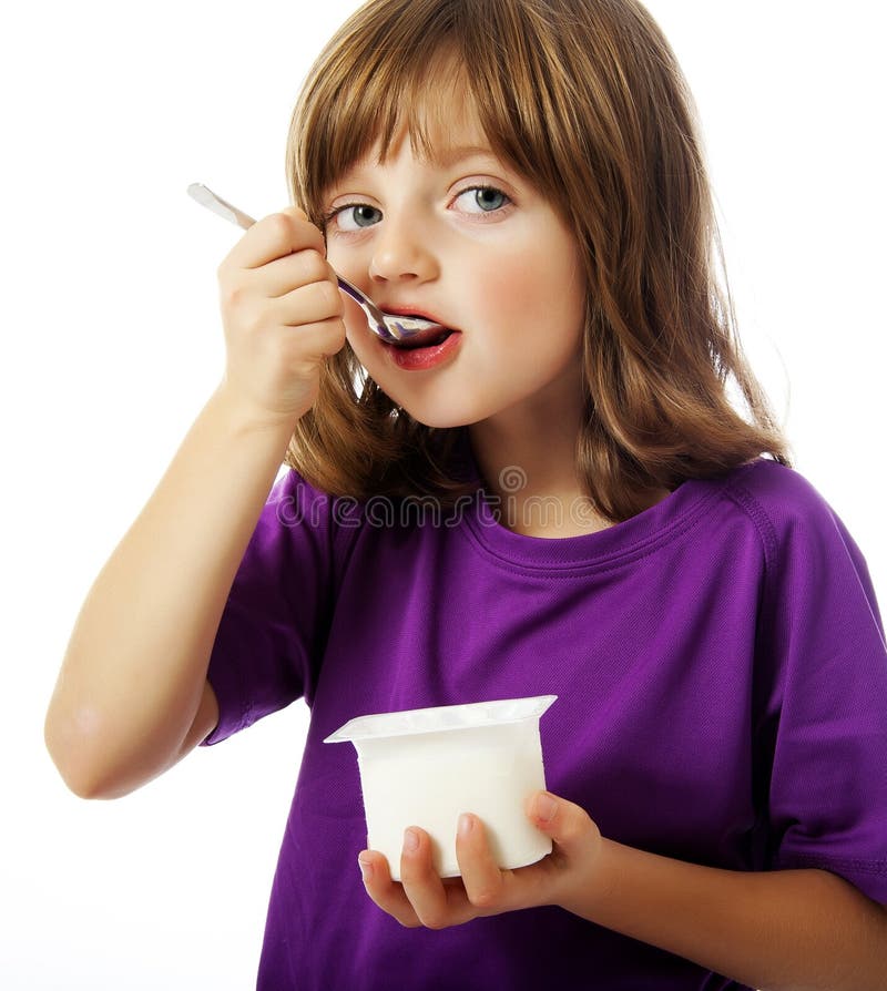 Little Girl Eating Yogurt, Mouth Wide Open Stock Photo Image of