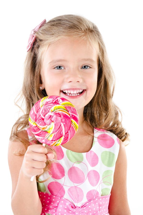 Happy little girl with lollipop isolated on a white