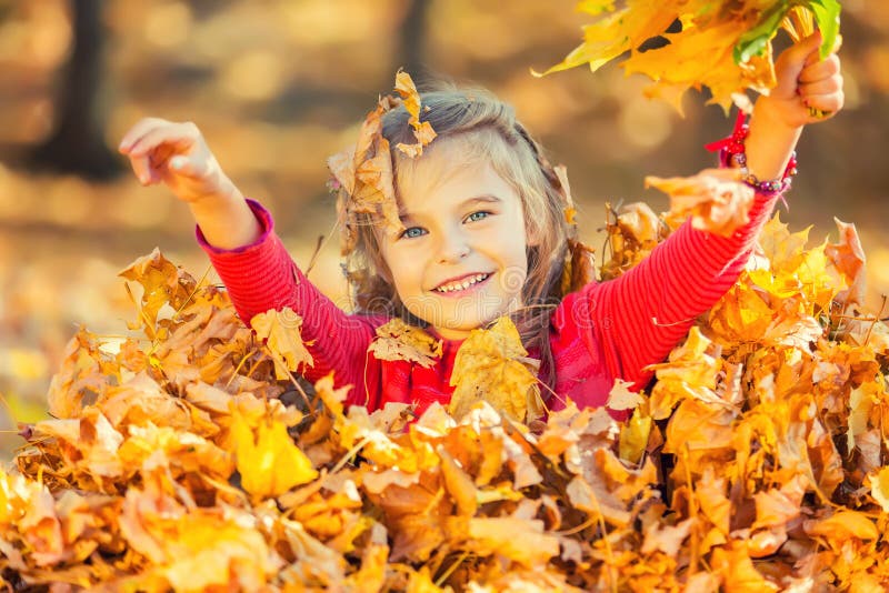 Happy Little Girl Plays with Autumn Leaves Stock Image - Image of ...