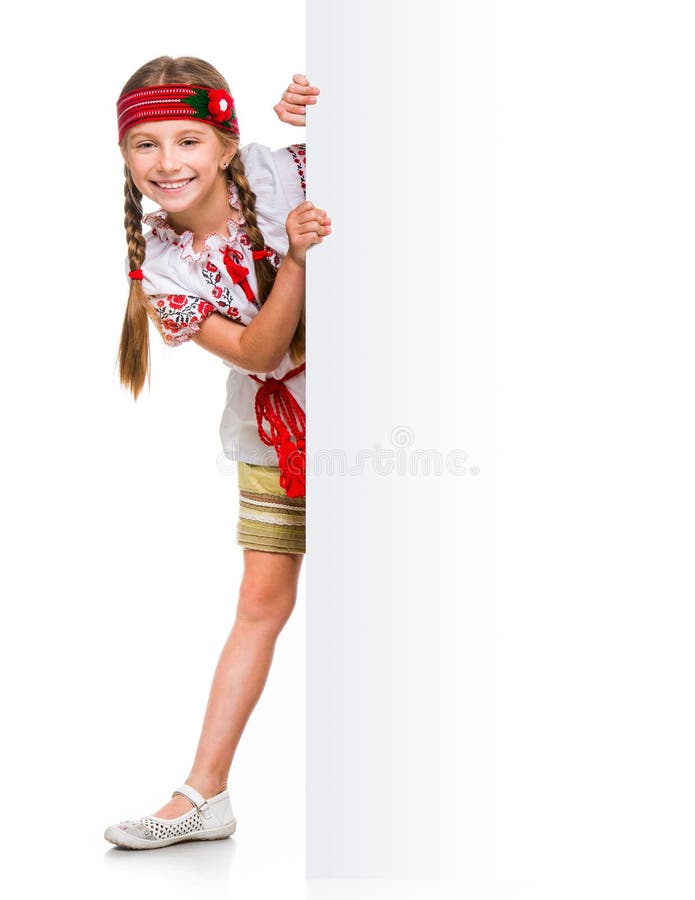 Happy little girl in the Ukrainian national costume stock images Happy little girl in the Ukrainian national costume stock images