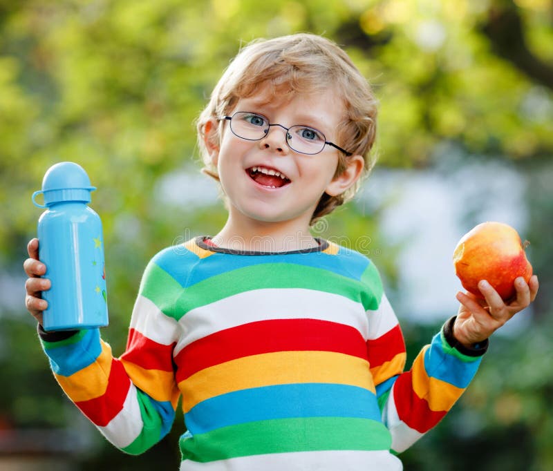 Happy Little Preschool Boy with Apple and Drink Bottle on His First Day ...