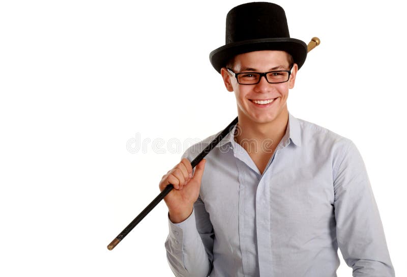 Happy magician on black hat with wand royalty free stock photo Happy magician on black hat with wand royalty free stock photo