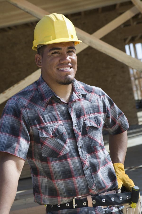 Happy Male Architect Wearing Hardhat royalty free stock images