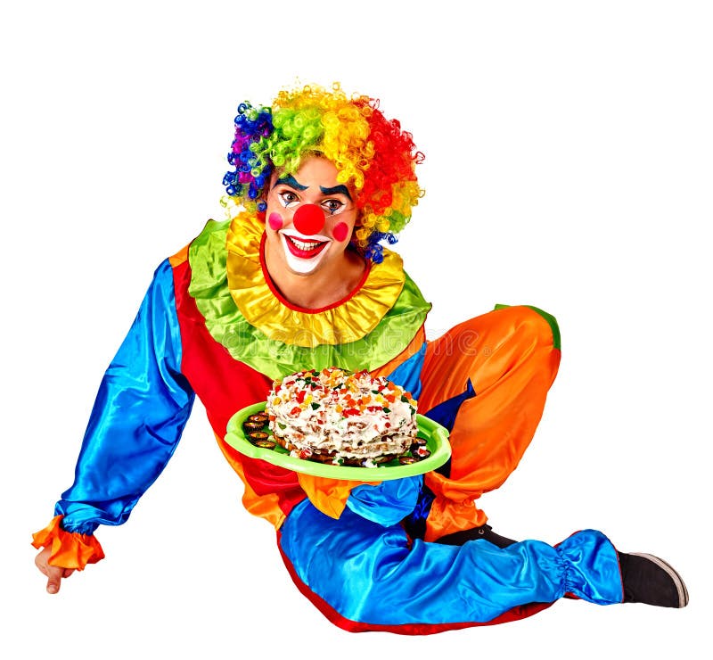 Happy male birthday clown holding cake. 