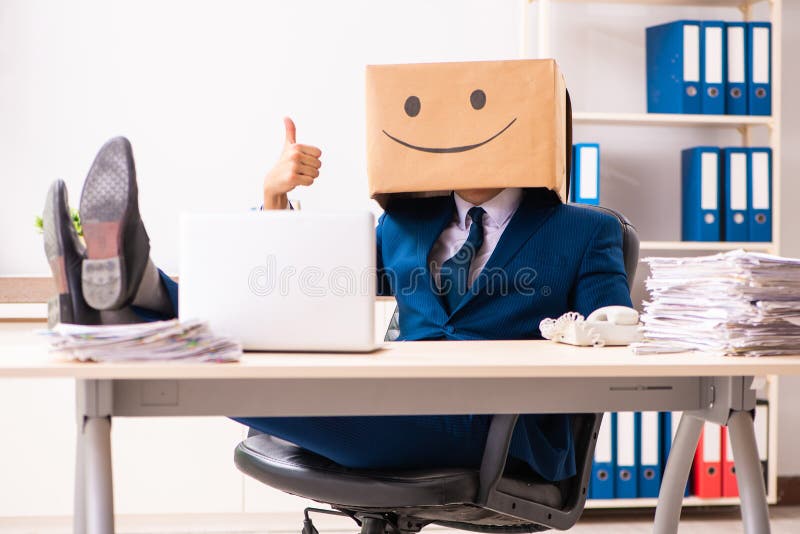 The happy man employee with box instead of his head