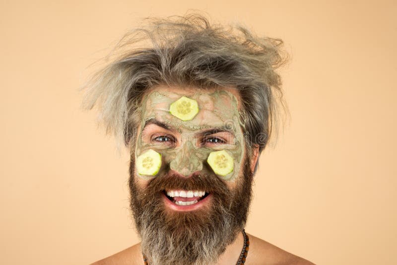 Happy Man with Funny Facial Mask with Cucumber Having Fun. Procedure ...