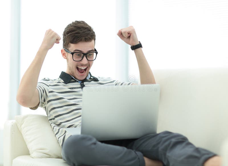 https://thumbs.dreamstime.com/b/happy-man-laptop-sitting-couch-photo-copy-space-happy-man-laptop-sitting-couch-129029775.jpg