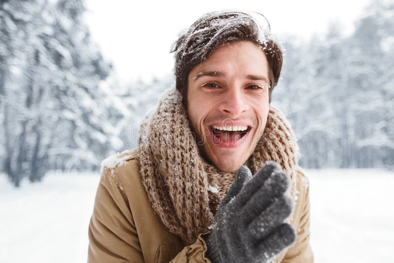 Happy Man Rubbing Hands Smiling Standing in Snowy Forest Stock Photo ...