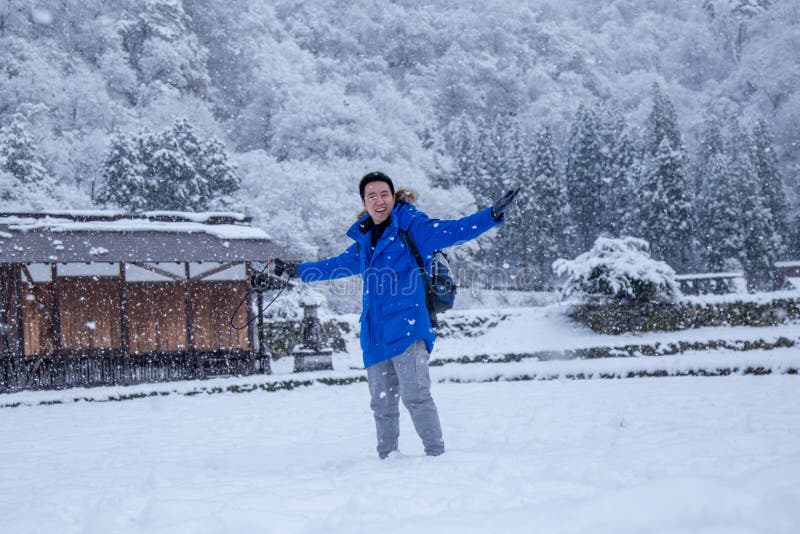 Man with snowing in Shirakawa-go, Japan