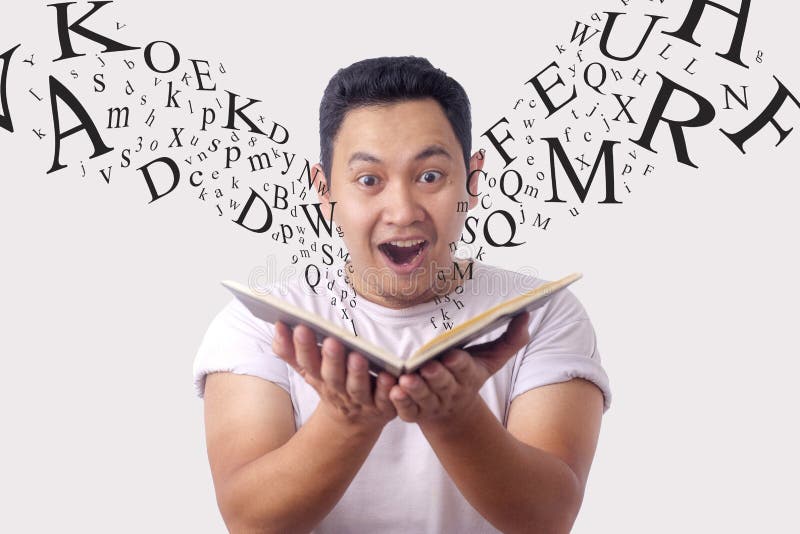 Happy Man Smiling While Reading Book stock photos Happy Man Smiling While Reading Book stock photos