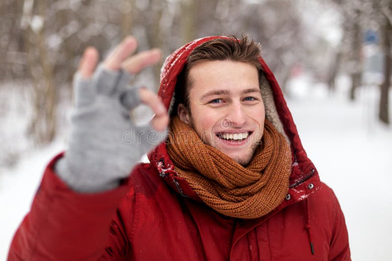 Happy Man in Winter Jacket Showing Ok Hand Sign Stock Image - Image of ...