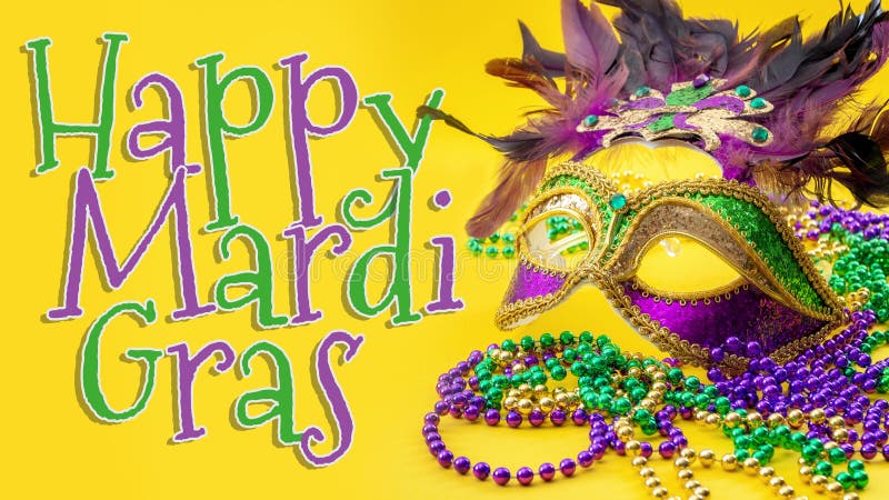 Happy Mardi Gras and Fat Tuesday carnival concept theme with close up on a face mask full of color, feathers and texture and